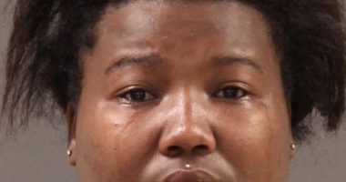 Looter Dayjia Blackwell, who livestreamed a mob-style looting spree in Philadelphia and encouraged others to join in, appeared distraught as police took her mug shot