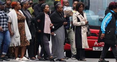 Pictured: Croydon schoolgirl's NHS mother at vigil for murdered daughter as family weep for 15-year-old stabbed to death 'by her friend's ex-boyfriend as he tried to win her over with flowers' in horrific rush-hour attack