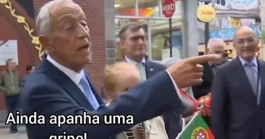 The Portuguese president told a young woman she might catch the flu as he pointed at her low neckline