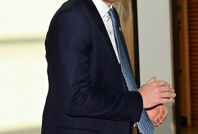 Prince Harry returned to Britain for the first time in three months today to attend a charity awards ceremony on the eve of the anniversary of the Queen's death