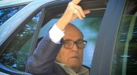 Rudy Giuliani was seen stepping out of his apartment and into a taxi to a business address in midtown Manhattan on Thursday
