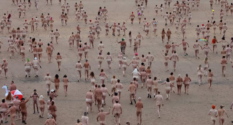 Septembare! 1,300 naked swimmers brave chilly North Sea at sunrise for the 11th annual North East Skinny Dip to mark the Autumn Equinox