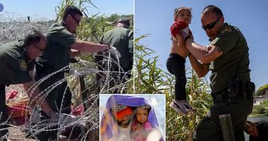 Shocking moment five Border Patrol agents CUT through razor wire at Eagle Pass and allow migrants to enter the US - after Texas Governor Abbott re-installed it along Rio Grande