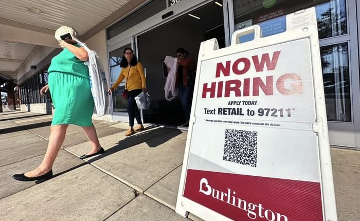 Slightly fewer number of Americans apply for jobless benefits as layoffs remain rare