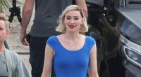 Sophie Turner cracks a relaxed smile and flashes HUGE barbed wire temporary back tattoo  as she films drama Joan in Spain amid  shock divorce from Joe Jonas