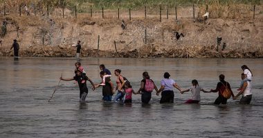 Migrants seeking asylum from the United States cross from Mexico via the Rio Grande on September 15. A three-year-old boy was traveling with his family Wednesday when a current separated him from his loved ones and carried him downstream. He was taken to a local hospital near Eagle Pass, Texas, and was pronounced dead