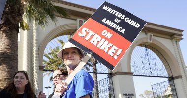 Writers celebrate WGA deal after getting 5% pay bump, streaming bonuses and protection against AI using their work as they can now return to their jobs after 148-day strike: Full summary of terms released