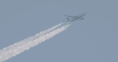 Chilling UFO video shows pill-shaped ‘craft’ coming out of a ‘wormhole’ just as plane passes overhead