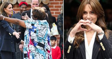 Kate channels Gareth Bale's signature heart gesture, plays table tennis and doles out hugs as she visits Cardiff with William to mark Black History Month