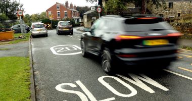 Life inside 20mph zone Britain: Furious Brits across the country say commuting times have doubled, drivers ignore limits to hit 50mph and no one enforces speed - as streets turn into rat-runs