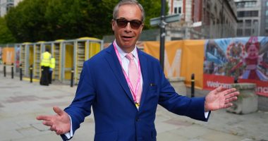 The Nigel and Liz show! Ex-Brexit Party leader Farage cheerleads Truss from the front row of her conference speech - as he backs her call to cut taxes before the next election and refuses to rule out a return to politics