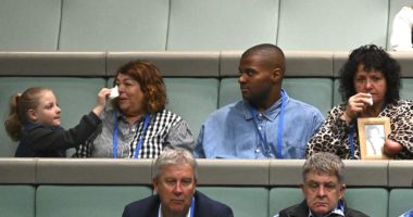 Australia apologizes for thalidomide tragedy as some survivors listen in the Parliament gallery