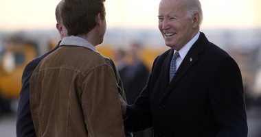 President Biden is set to rip into Rep. Lauren Boebert on a trip to Colorado. Here he greets Colorado Gov. Jared Polis, and Denver Mayor Mike Johnston