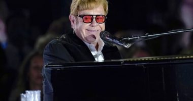 Elton John addresses Britain's Parliament, urging lawmakers to do more to fight HIV/AIDS