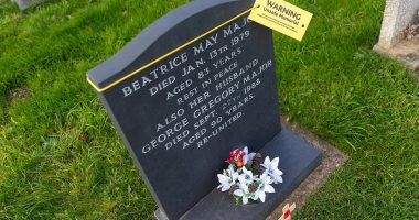Fury after 'disrespectful' council sticks yellow 'unsafe memorial' tags on dozens of gravestones after inspecting the village churchyard - as bereaved residents blast officials for 'blatant misuse of health and safety policies'