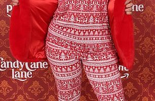 Jordin Sparks embraced the holiday season as she arrived at the premiere of Amazon Prime Video's Candy Cane Lane on Tuesday night in Los Angeles