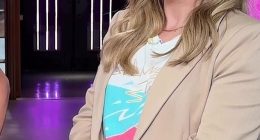Kelly Clarkson modeled a chic beige suit with a statement T-shirt on her daytime talk show on Wednesday. The star looked slender after losing weight this summer during her move from Los Angeles to New York with her two children