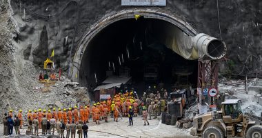 Miracle beneath the mountain: Indian rescue team working to save 41 construction workers trapped in collapsed road tunnel for 17 days say they will be free 'soon' after building a pipe through the rubble to reach them