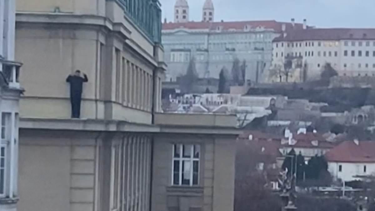 Prague shooting: Clinging on to ledges 40ft up, building barricades