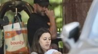 Adrian Portelli is seen with girlfriend Karlie Butler and newborn son