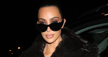 Kim Kardashian exudes glamour in a black faux-fur coat