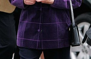 Queen Elizabeth II embarks on the Hebridean Princess at Port Ellen, Scotland, for a cruise around the Western Isles with her family in 2006