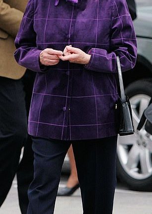 Queen Elizabeth II embarks on the Hebridean Princess at Port Ellen, Scotland, for a cruise around the Western Isles with her family in 2006