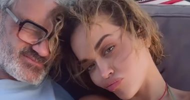 Rita Ora is showered with kisses by husband Taika Waititi