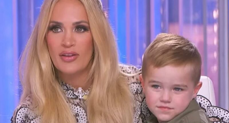 Carrie Underwood tears up for surprising reason while holding a child during an American Idol audition