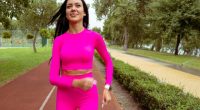 woman walking on track, concept of 50-mile month walking challenge