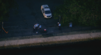 There are grave concerns for a man who is missing after a car rolled down a boat ramp and into the waters on Sydney's lower north shore.