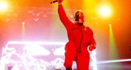 'Anti-British' balaclava-clad rap group Kneecap say they are taking action against their critics after 'being caught shouting pro-Hamas chants' at gig