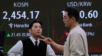 Asian markets rally after Wall Street ends higher in the chaotic and historic week