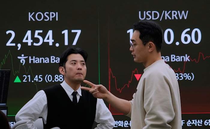 Asian markets rally after Wall Street ends higher in the chaotic and historic week