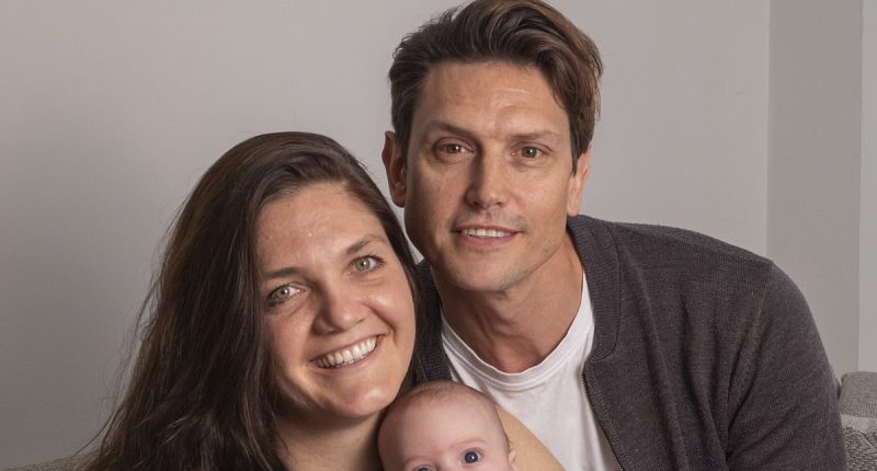 Baby who was born TWICE! Surgeons' incredible five-hour op to lift mother's womb - still containing unborn Rafferty - out of her body at 20 weeks to treat ovarian cancer