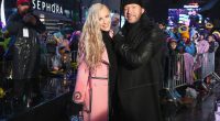 Jenny McCarthy and Donnie Wahlberg pose during Dick Clark