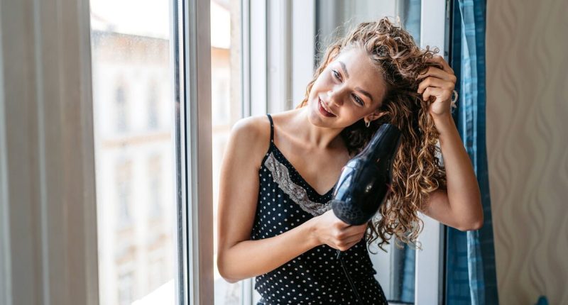 Hair drying mistake could be causing dandruff, dermatologist says