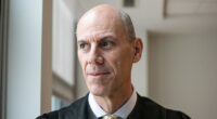 Justice Department files misconduct complaint against judge in key deportations case