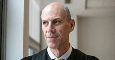 Justice Department files misconduct complaint against judge in key deportations case