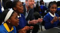 Prince William roared with laughter as he played video games with the centre's young people