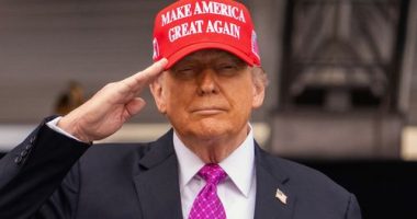 President Donald Trump salutes during the United States Military Academy commencement ceremonies in West Point on May 24