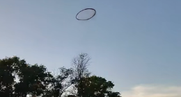 A black ring in the sky has slowly disappeared before shocked witnesses, raising questions about its origin.