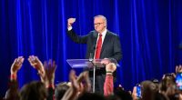 'Not Labor red or Liberal blue': Tearful Albanese celebrates win with favourite prop