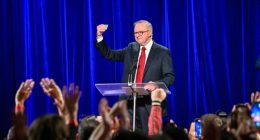 'Not Labor red or Liberal blue': Tearful Albanese celebrates win with favourite prop