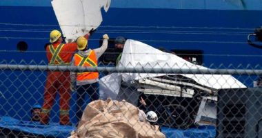 Debris from the Titan submersible, recovered from the ocean floor near the wreck of the Titanic, is unloaded from the ship Horizon Arctic at the Canadian Coast Guard pier in St. John's, Newfoundland.