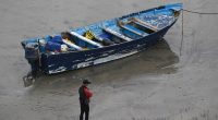 5 people charged after migrant boat capsized, killing 3, including 14-year-old boy from India
