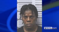 Tracy Walker mugshot, placed on a blue background with the WKRG.com logo
