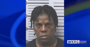 Tracy Walker mugshot, placed on a blue background with the WKRG.com logo