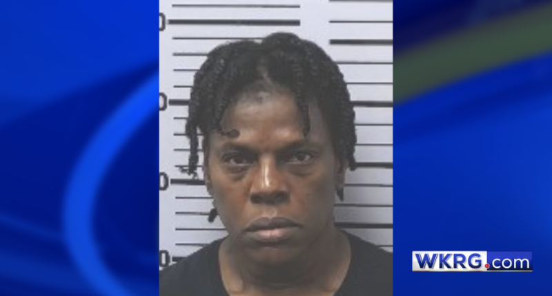 Tracy Walker mugshot, placed on a blue background with the WKRG.com logo