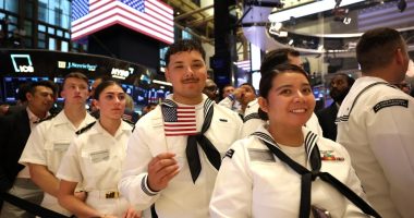 Military personnel at the New York Stock Exchange.
